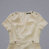 Beige textured Dress on a tiled floor